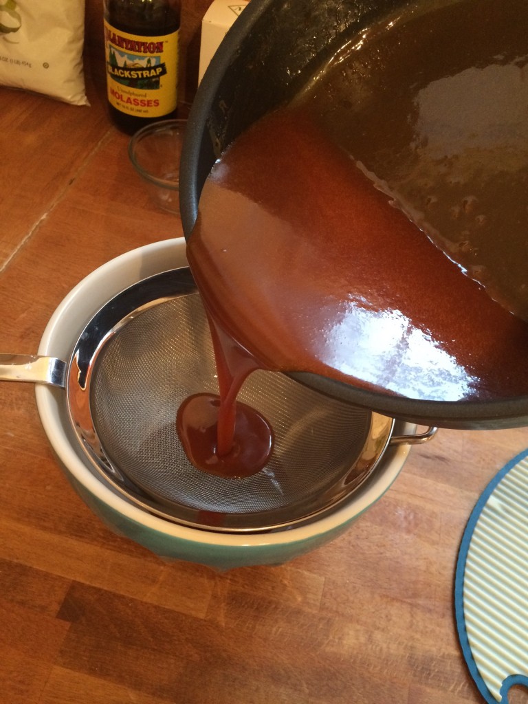 pour through a sieve into a bowl