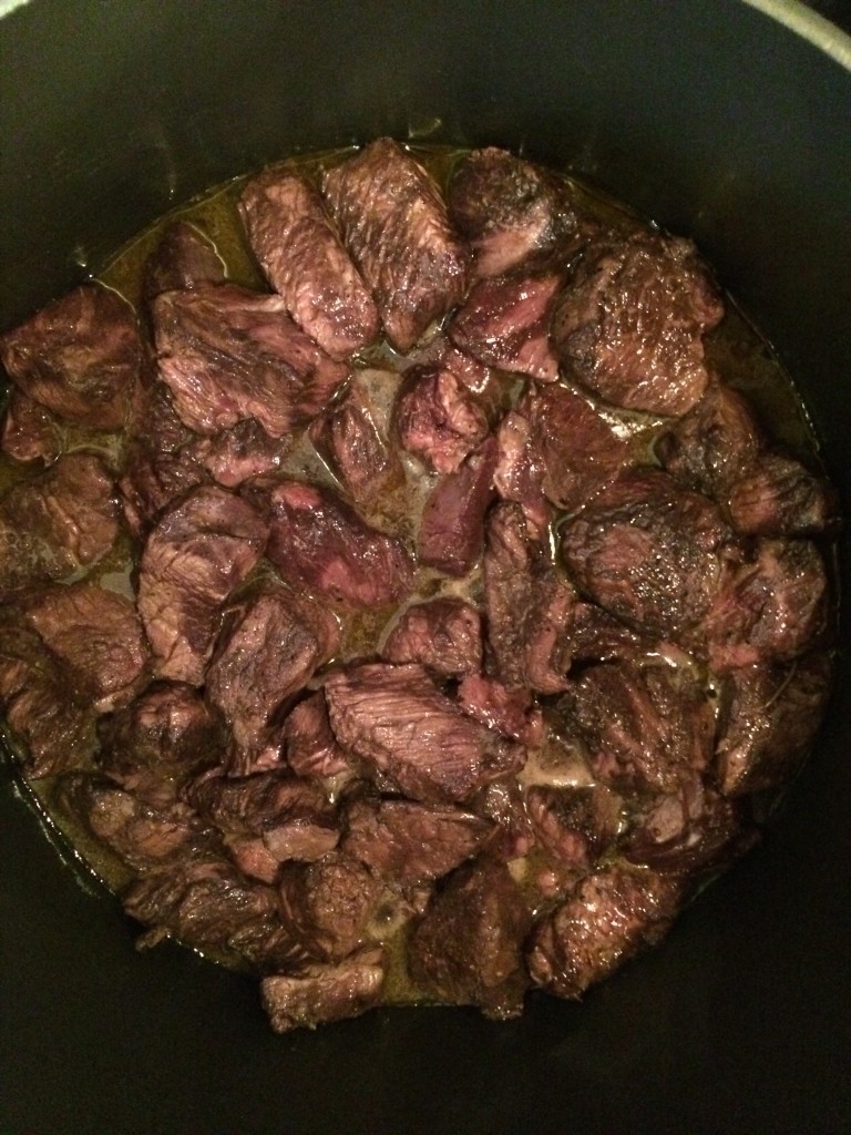 Once all the meat is browned (and don't worry it doesn't have to be cooked through)...