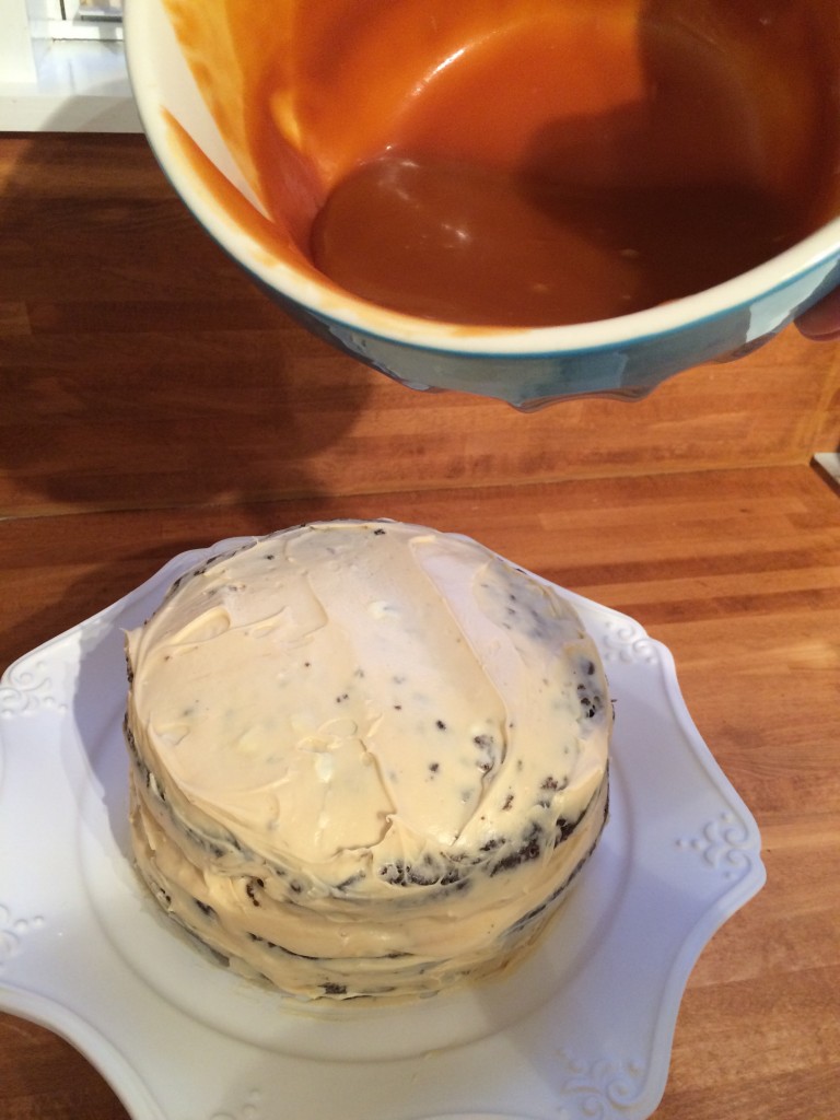 Remove cake from fridge and pour the rest of the salted whiskey caramel over the cake 